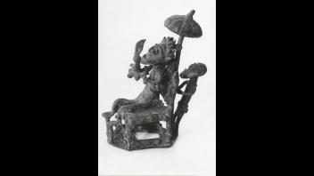 Ashanti (Asante) bronze figure seated under a canopy, from the Ashanti territory of Southern Ghana.