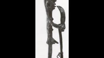 Ashanti bronze figure of male with a sword.