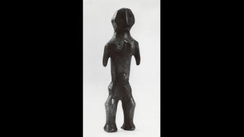 Antique ivory standing female figure with partially truncated arms. From the Belgian Congo, West Africa.