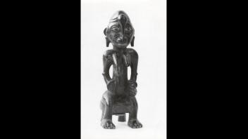 Seated female carved wood figure from Senufo Ethnographic Territory, Northern Côte d'Ivoire and Mali, West Africa