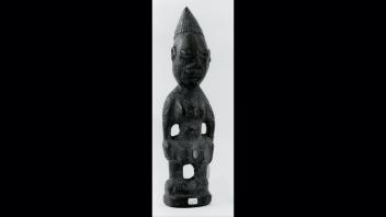 Carved wood female figurine with pointed headdress. From Yoruba Ethnographic Territory, Southwestern Nigeria and Bénin, West Africa.